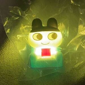 TAMAGOTCHI mametchi on the sofa, light up figure